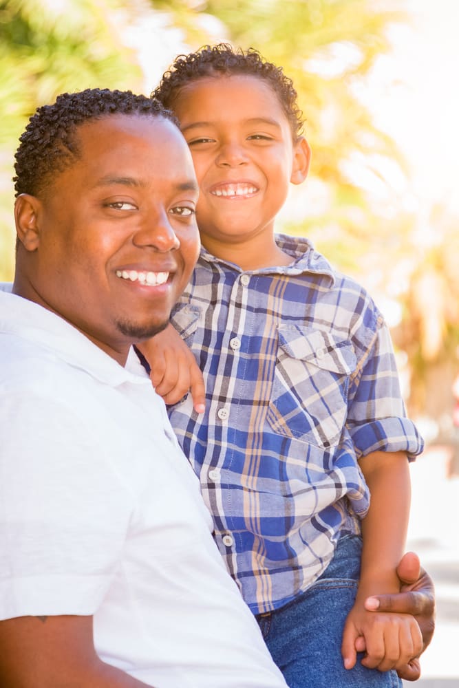 Father and son looking relaxed and happy together